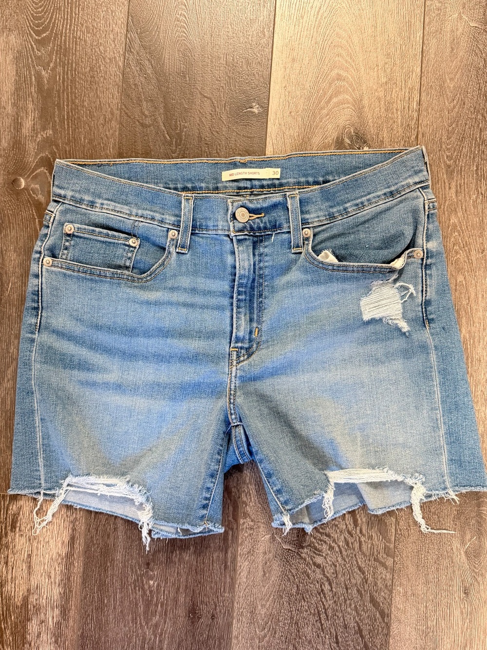 Levi's 312 Mid Rise Mid Length Super Stretch Distressed Denim Shorts